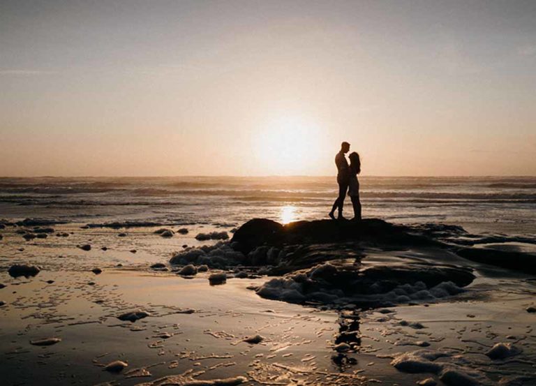 Couple at Kariotahi Beach